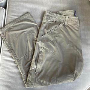 Kuhl performance cargo pants with stretch in a khaki green color. Waist is 36”